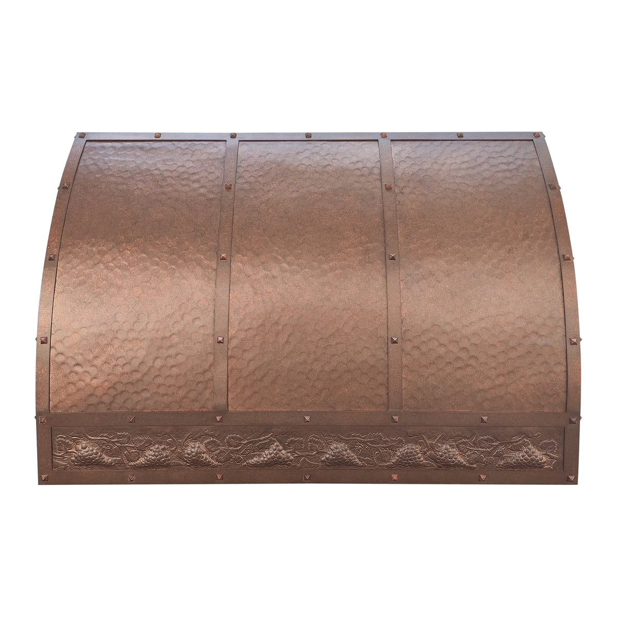 Copper stove hood with textured surface and decorative elements