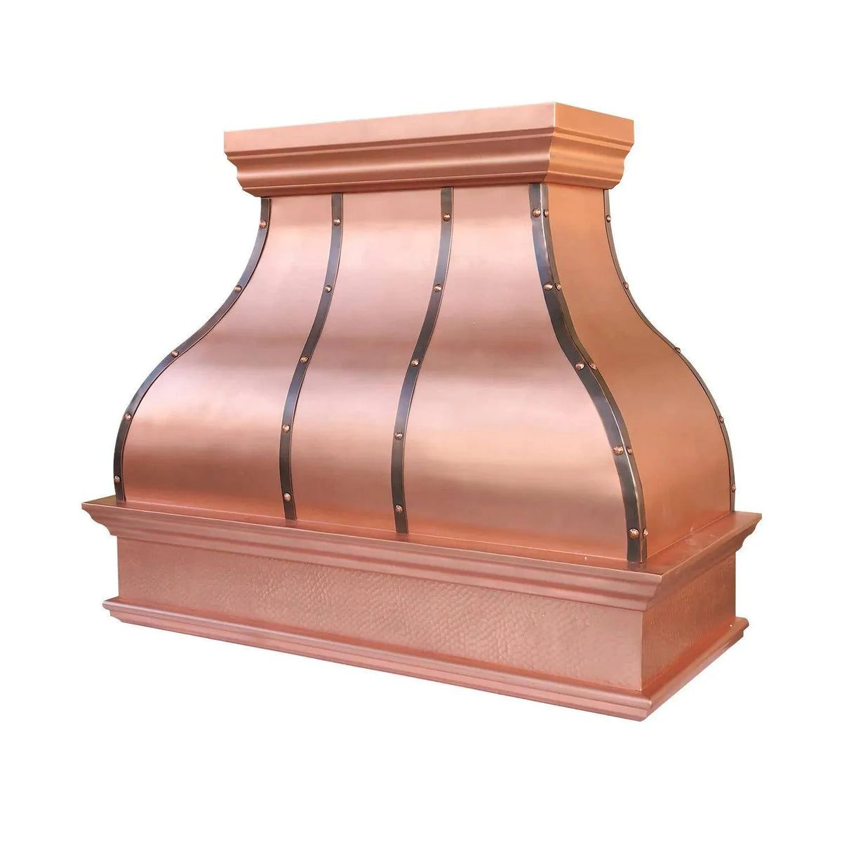 A handcrafted Fobest copper range hood with smooth body and hammered apron