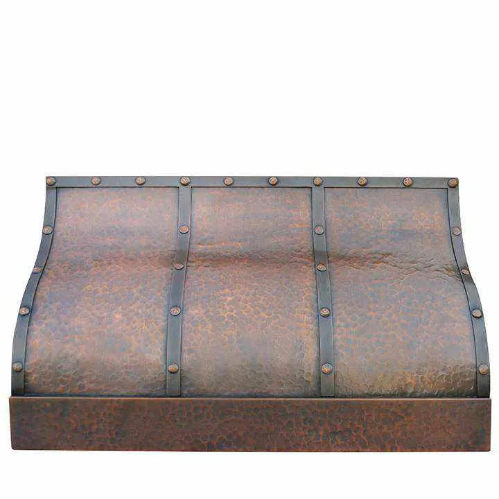 Handmade copper range hood with a barrel shape design, featuring straps and rivets.
