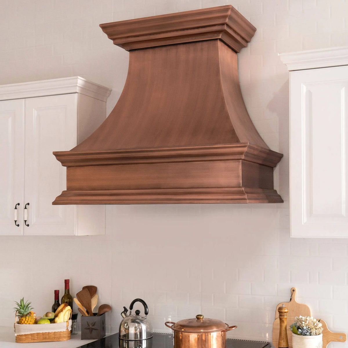 FOBEST Antique copper range hood with a classic retro curved shape and a crown design, handmade smooth texture.