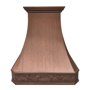 A vintage copper range hood with a custom pattern, featuring a smooth, curved design.