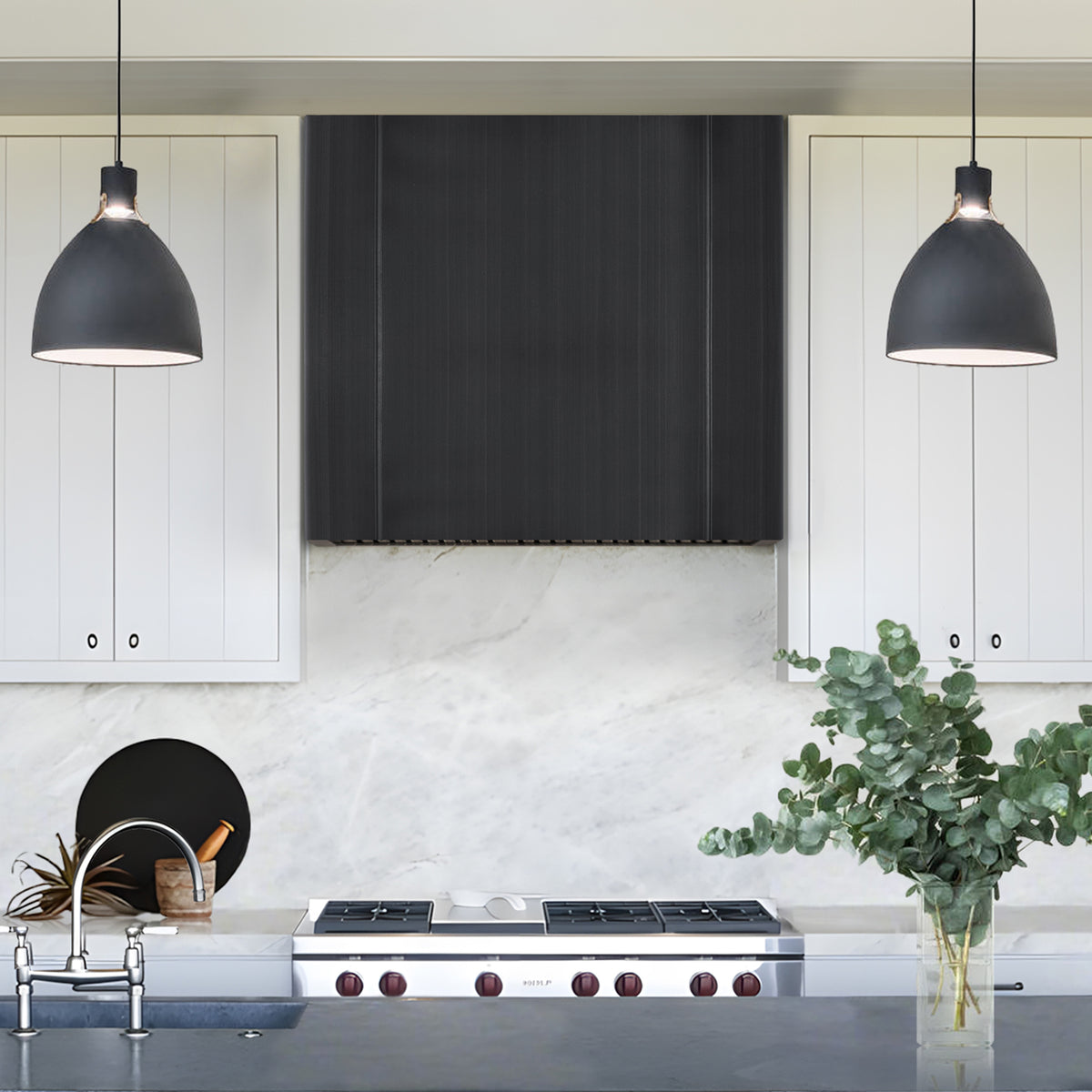 Modern kitchen with grey custom range hood, 