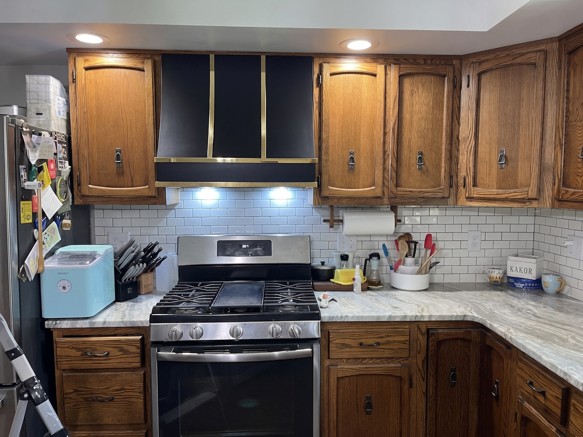 Fobest Custom Black Stainless Steel Range Hood with Polished Brass Accents FSS-612