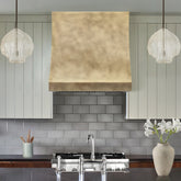 Fobest Custom No-Directional Aged Brass Range Hood in Curved Square Design FSS-572