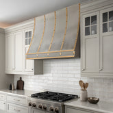 Fobest Custom Sloped Stainless Steel Range Hood with Brushed Brass Accents and Rivet Details FSS-685