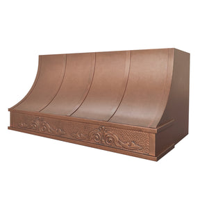 Decorative copper range hood on a white background