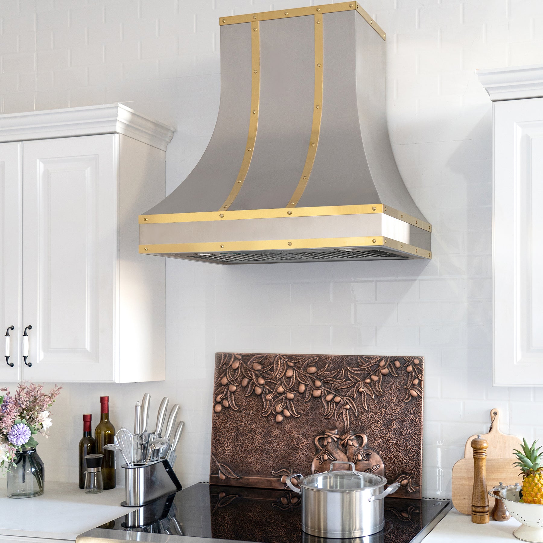 Fobest custom brushed stainless steel range hood with brass straps 